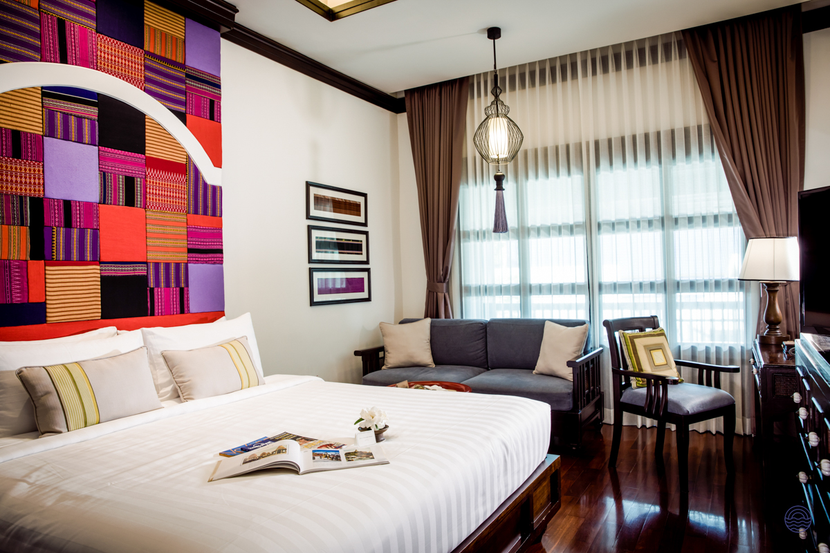 Spacious and serene resort room in Chiang Mai, featuring a comfortable king bed and traditional Thai decor.