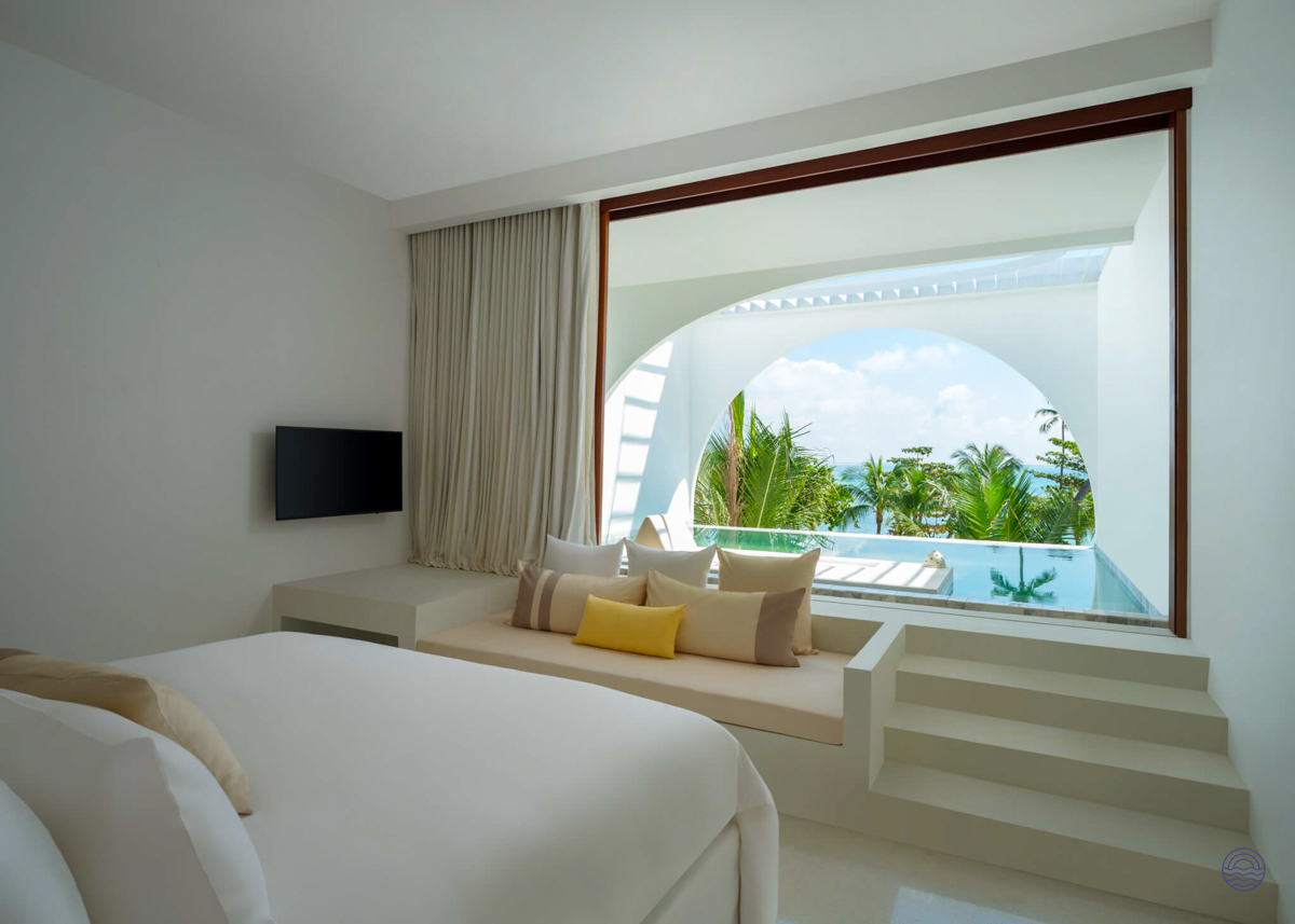 Spacious bedroom with a private plunge pool overlooking the ocean in Koh Samui.