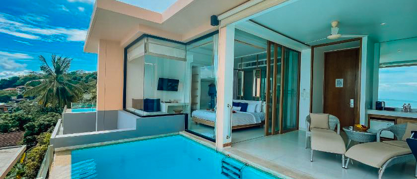 Luxurious resort room with a private plunge pool and ocean view in tropical Thailand.