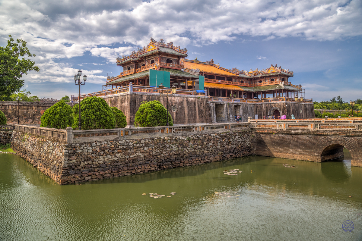 The majestic Imperial Citadel in Hue, Vietnam, with its grand traditional architecture and surrounding moat.